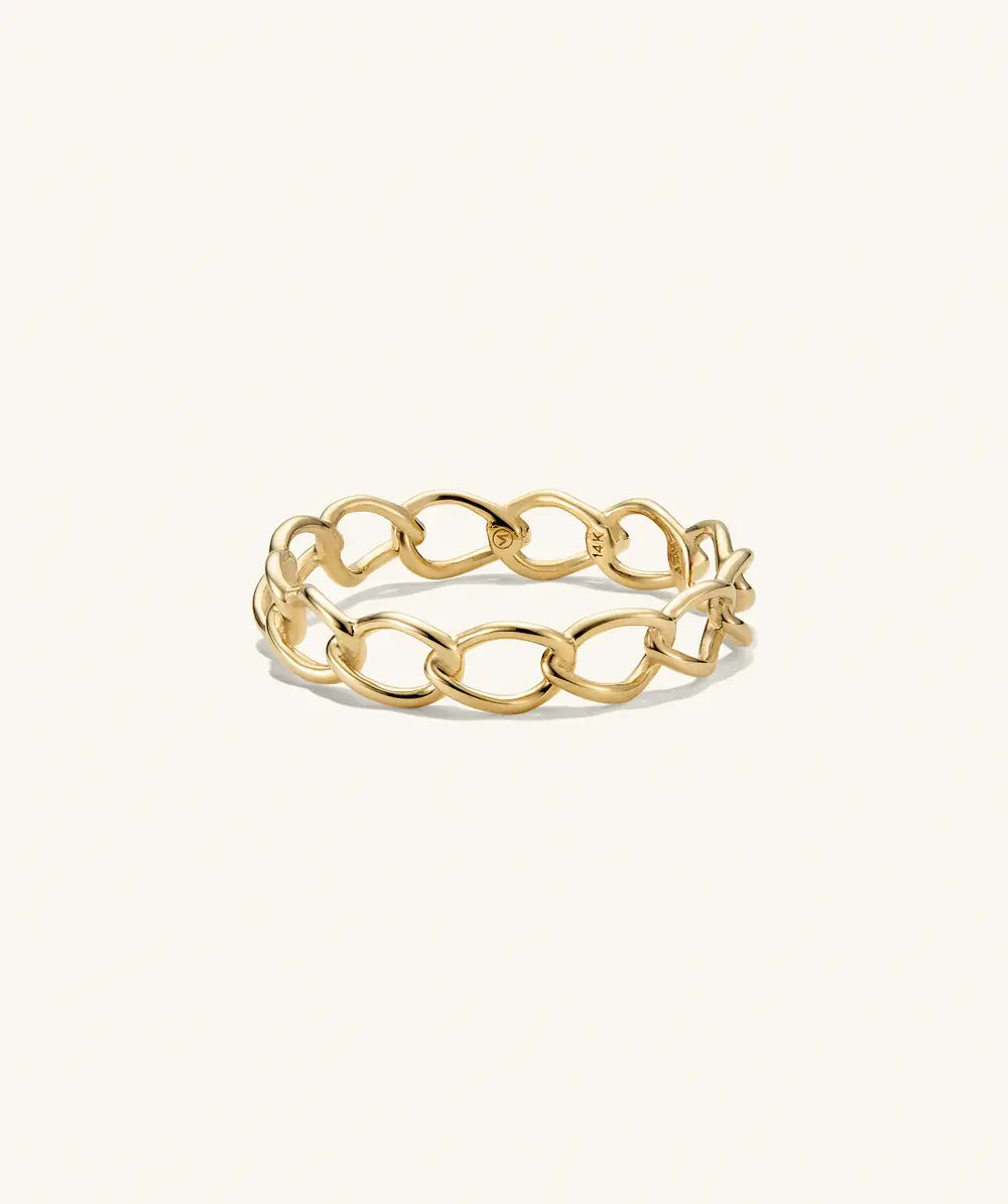 Elegant flätad guldring